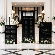 wedding seating plan displayed on black and white checkered table cloth in front of marble floor