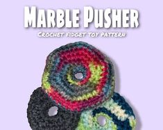 three crochet coasters with the words marble pusher on them