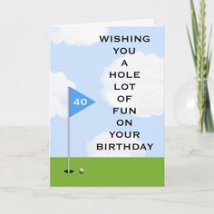 a birthday card with a golf hole and the words wishing you a hole of fun on your birthday