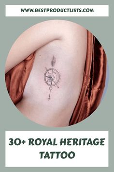 the back of a woman's chest with an arrow and compass tattoo on it