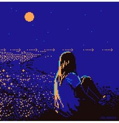 a woman sitting on the edge of a cliff at night