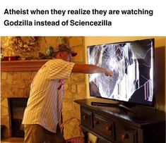 a man pointing at a television screen with the caption,'artist when they reazie they are watching godzilla instead of science fiction