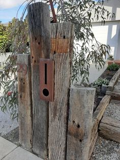 a bird house made out of old wood