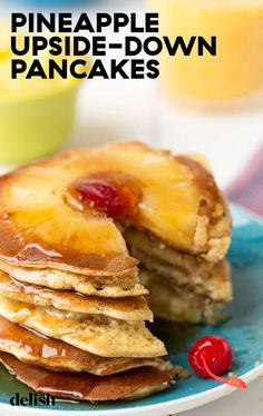 pancakes with pineapple upside down on a blue plate