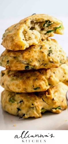 a stack of biscuits sitting on top of a white plate