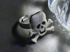 Looking for scary jewelry to wear during the Halloween holiday or any time of year?  A skeleton charm adheres onto an adjustable silver plated ring.  The skull charm is about 20 x 22 mm. Fits most sizes. ♥ See more Halloween jewelry here: https://www.etsy.com/shop/iceblues/items?ref=listing-shop-header-item-count§ion_id=10461899 GIFTS Each item is individually wrapped in a branded jewelry gift box. We do not include price receipts in the package. We are happy to ship directly to the recipient. EXPEDITED SHIPPING At checkout, you have the option to choose faster shipping in the drop-down menu. Ship times do NOT include production times. However, if you select expedited shipping, we will try to get your order completed faster. SHOP FAQs Please read my shop policies for my current production Scary Jewelry, Halloween Rings, Creepy Jewelry, Skeleton Jewelry, Halloween Ring, Jewelry Halloween, Jewelry White, Halloween Jewelry, Skull Ring