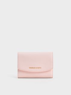 This item is part of our Online Exclusive selection, which consists of unique colourways and designs that are only available for purchase at CHARLESKEITH.COM.This product is made with at least 20% sustainable materials by weight. CHARLES & KEITH uses recycled, degradable, organic, and water-based materials in our eco-conscious collection.If you love pastels, you are certain to love this small wallet in a gorgeous, light pink. The caviar finish makes this piece incredibly durable, even with daily Charles And Keith Bags, Cash Wallet, Cute Wallets, Charles Keith, Small Wallet, If You Love, Kids Gifts, Pink Bag, Sales Gifts