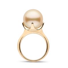 The Oracle Collection ring features a large 11.0-12.0 mm, AAA quality Golden South Sea pearl, prominently displayed in the contoured embrace of it's sleek setting. Like a vision of the divine, this ring "speaks" the wisdom of the truest kind of simple, natural beauty. Golden South Sea pearls are among the most sought-after pearls in the world. They are also the most rare, growing in only a few remote locations around the world. The golden pearl set in this ring was grown in the warm, tropical wa Pearl Ring Design, South Sea Pearl Ring, Golden Jewellery, Fine Pearl Jewelry, Golden South Sea Pearls, Jewelry Appraisal, Golden Jewelry, Golden Ring, Sea Pearl