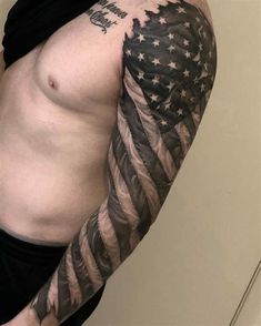 a man with an american flag tattoo on his arm