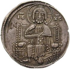 an old coin with the image of jesus on it