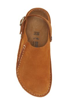 A convertible slingback strap adds dual functionality and styling options to a classic suede clog grounded by a contoured, arch-supporting footbed. Adjustable slingback strap with buckle closure Contoured cork footbed with arch support Leather upper and lining/synthetic sole Imported Arch Support Slippers, Teacher Fits, Men Birkenstock, Birkenstock Men, Suede Clogs, Fall Shoes, Cool Boots, Dream Shoes, Christmas Signs