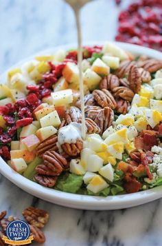 four different pictures with food in them including bread, fruit and flowers on the table