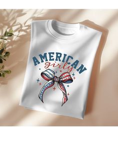 an american girl t - shirt with a bow on it