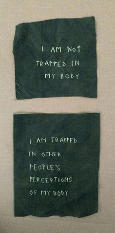 two pieces of black paper with writing on them that say i am not trapped in my body