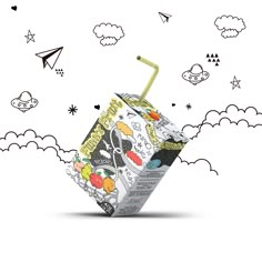 a carton filled with lots of stickers on top of a white surface next to clouds