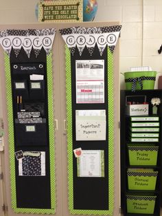 two green and black lockers with papers on them in front of a white wall