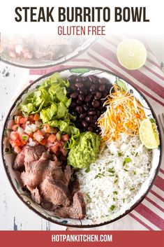 steak burrito bowl with white rice, black beans, cilantro and lime