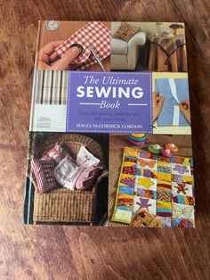 the ultimate sewing book on a wooden table