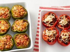 several stuffed peppers are on a white plate and next to a red and white towel