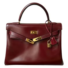 Exquisite 1955 Hermès Kelly 32 Retourné Rouge H Box Calf Leather Handbag For Sale at 1stDibs Handbag Still Life Photography, Hermes Kelly 32 Street Style, Rare Hermes Bags, 50s Handbags, Rare Bags, Vintage Kelly Bag, Vintage Hermes Bag, Kelly Hermes, Hermes Kelly 32