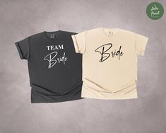 Celebrate the bride-to-be with this stylish "Bride" and "Team Bride" shirts! These matching shirts are perfect for bachelorette parties, bridal showers, or pre-wedding festivities. Crafted from soft, high-quality fabric, they provide both comfort and style. The minimalist "Bride" text in elegant script makes a statement, while the "Team Bride" design brings everyone together to support the big day. Available in classic neutral shades, these shirts are a must-have for any bridal celebration. --- How to Order --- Step 1: Select your preferred T-Shirt size Step 2: Select your preferred T-Shirt color Step 3: Add your personalization (optional) Step 4: Choose your shipping preference Step 5: We prepare and ship your order quickly! Step 6: Your order arrives! Don't like it? Always reach out to u Bachelorette Matching Shirts, Bachelorette Matching, Funny Bachelorette Shirts, Bride Design, Funny Bachelorette, Team Bride Shirts, Stylish Bride, Bachelorette Shirt, Minimalist Bride