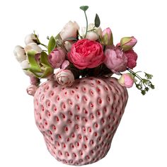 a pink vase with flowers in it on a white background