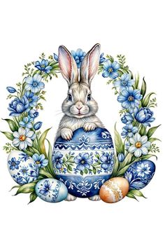 a blue and white bunny sitting on top of an easter egg with flowers around it