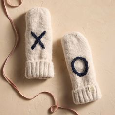 Treat someone you love to the cozy warmth of these flip-top mittens, perfect for bundling up on winter strolls. Each pair is lined with plush fleece and finished with ‘XO’ details. Cold Weather Travel, Skier Gifts, Winter Travel Outfit, Trip Outfits, Knit Mittens, Winter Travel, Winter Accessories, Fashion Essentials, Mitten Gloves