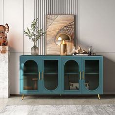 a blue cabinet sitting in the middle of a living room