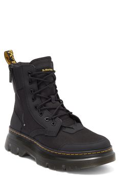 The label's Original boot gets reimagined for contemporary utility in a hybrid construction of lightweight Ajax leather and Extra Tough 50/50 fabric.The cemented Tarian lug sole is finished with DM's iconic yellow topstitching. 2" platform, 6" shaft (size 9) Lace-up style; side zip closure Textile and leather upper/leather lining/synthetic sole Imported Lug Sole, Up Styles, 50 50, Boots Men, Side Zip, Leather Upper, Nordstrom, Lace Up, Boots