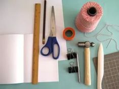 craft supplies laid out on top of a table