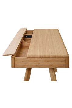 a wooden table with an open drawer on it's top and bottom section in the middle