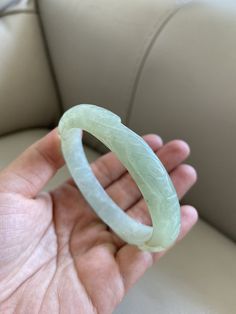 "🌈 Jade Bangle 58.6mm (2.31\"), Round Shape, Light Green 🌷 Untreated Natural Jadeite/ Grade A Jade 🌷 Certified : Yes 🌷 Jade from Myanmar/ Burma 🌷 Shape : Round 🌷 Inner diameter : 58.6mm / 2.31\" 🌷 Width & Thickness : 11.3 x 7.6mm 🌷 Color : Light Green 🌷 Free standard shipping from Hong Kong with tracking included 🌷 Take approximately 7-21 days to arrive worldwide ❤️ In Chinese Culture: Young people wear jade pendant will have a prosperous life, attracts good luck and friendship Old Elegant Carved Green Bangle, Elegant Green Carved Bangle, Carved Jade Round Bracelets, Carved Jade Bracelets, Carved Round Bracelets For Wedding, Carved Round Wedding Bracelets, Wedding Carved Round Bracelets, Carved Jade Bracelet, Lavender Green