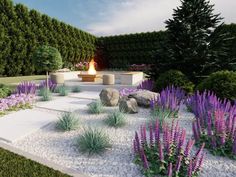 an outdoor fire pit surrounded by purple flowers and rocks in the middle of a garden