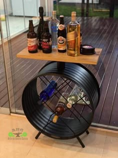 a wine rack with bottles and liquor on it