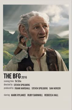 an old man with white hair is standing in front of a poster that says the bfg