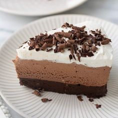 a slice of chocolate mousse cake on a plate with the text gluten - free chocolate mousse cake