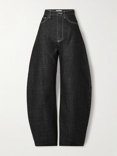 Alaïa's 'Archetypes' collection draws inspiration from some of its most iconic styles. Part of the lineup, these high-rise jeans are made from black denim with contrasting topstitching and have wide legs that taper toward the ankles to create a voluminous balloon shape. Balloon Jeans, Barrel Jeans, Chunky Oversized Sweater, Fitting Room, Upgrade Your Wardrobe, Leather Outerwear, Denim Chic, Jean Trends, Runway Trends