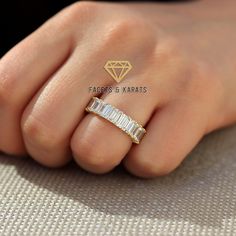 A simple emerald cut eternity band made for you in 14k solid and real yellow gold but as always available in either 14k white, yellow or rose gold. Each emerald cut in this ring has a diameter of 5x3mm which equals an average carat weight of about 0.28ct per emerald cut stone. I'll be more than happy to change the stones to Charles and Colvard Moissanite, Lab-Grown or Natural Diamonds. Please message me with your ring size for a quick price quote. This ring makes a perfect anniversary band or pr Stackable Emerald Cut Eternity Band For Anniversary, Emerald Cut Eternity Band, Emerald Eternity Band, Gold Eternity Ring, Wedding Anniversary Ring, Charles And Colvard Moissanite, Ring Emerald Cut, Eternity Ring Gold, Engagement Band