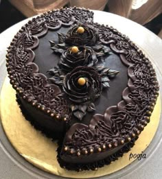 a chocolate cake sitting on top of a table