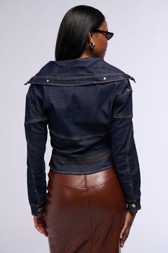 Level up your denim collection with The AKIRA Label Raw Denim Collared Jacket. This semi-stretchy denim piece features a wide fold over collar, long sleeves with buttoned cuffs, utility seaming, faux silver metallic hardware, contrast stitching, and decorative button detailing. Complete with a slight cropped front, symmetrical pointed hems, and button down front closures. Style with a denim maxi skirt and mules to finish off your look.  - Shell: 60% Cotton 35% Polyester 3.5% Viscose 1.5% Spandex - Semi-Stretchy - Imported (all measurements are approximate from size small) - 20.5” Shoulder to Hem - 21.5” Sleeves - 20.5” Shoulder to Shoulder  - Model is 5’8” Product ID: 392740 (all measurements are approximate from size 1X) - 23” Shoulder to Hem  - 23.5” Sleeves - 25” Shoulder to Shoulder Pr Minimalist Maximalist, 45th Birthday, Collared Jacket, All White Party, Denim Maxi, White Accessories, Denim Maxi Skirt, Denim Collection, Raw Denim