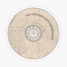 an old record with writing and a clock on it