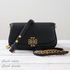 Nwt Tory Burch Britten Convertible Leather Crossbody In Black Details: 100% Leather Front Flap With Magnetic Closure Removable/Adjustable Top Handle Single Compartment; One Zipper And Slip Pocket Gold-Tone Hardware Removable Chain/Leather Strap Size: 8.75" L X 5" H X 2.5" D In Smoke Free Home!! All Items Are Guaranteed 100% Authentic And Brand New ! Tori Burch Bags, Tory Burch Britten, Foldover Crossbody Bag, Tory Burch Crossbody Bag, Large Hobo Bag, Tory Burch Purse, Metallic Purse, Crossbody Messenger Bag, Purse Accessories