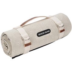 the yoga mat is rolled up and ready to be used as a pillow or blanket