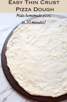 the homemade pizza dough is ready to be made into an easy thin crust pizza dough