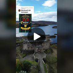 an aerial view of a castle with water in the background and a video player playing