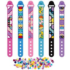 six colorful watch bands with different designs on them and sprinkles in the bottom row