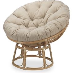 a round chair with a cushion on it's back and seat pad in the middle