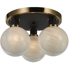 three light fixture with glass globes on an antique brass plated metal ceiling fixture