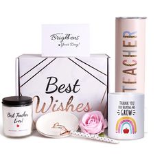 the best wishes gift set includes two mugs, a candle and some other items